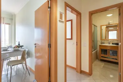 an overhead view of a building with a pool at BnB Homes Ocean view Apartment with panoramic Terrace, 2 Swimming pools & Tennis court in Albufeira