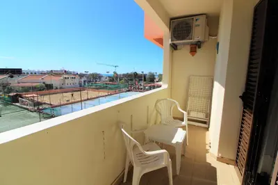 a view of a swimming pool from a apartment at Centre City - Albufeira in Albufeira