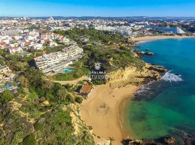 an aerial view of a beach and the ocean at Aveiros Beach Apartment Ocean View - By Dalma Portuguesa in Albufeira