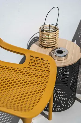 a yellow chair and a table with a basket on it at Salgados 2-Bedroom Apartment - 900m from the Beach - Wifi in Guia