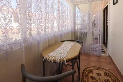 a dressing room with a stool and a window at Apartamento Pateo - Algarve - BY BEDZY in Albufeira