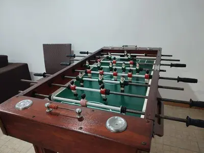 a large billiard table with at Casa Felicidade in Albufeira