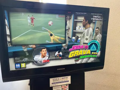 a television screen with a soccer game on it at Fresh and cosy appt with Pool, Fiber, LargeTV, Gaming Room in Albufeira