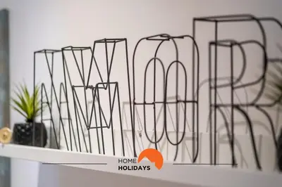 a shelf with several metal sculptures on it at #094 Maresia Flats by Home Holidays in Albufeira