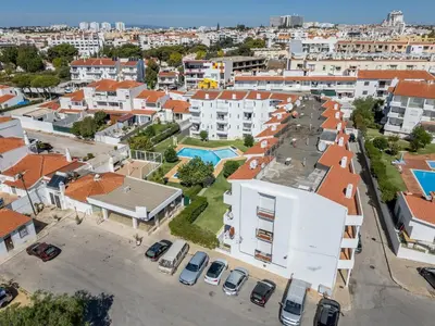an aerial view of a city with buildings at Beco do Sol, Albufeira in Albufeira