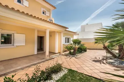 a villa with a view of a house at Villa Das Oliveiras amazing location walk to Marina restaurants beach in Albufeira