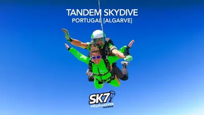 two people in the air on a tandem skydiving parachute at Perfect location NEW holiday apartment in Albufeira