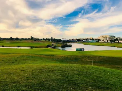a view of a golf course with a river at Marina Vilamoura Aquamar 304 By Vilamoura Sun in Vilamoura