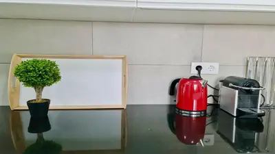 a fire hydrant and a plant on a counter at Vila Renascer-CleverDetails, few minutes from the center, quiet area in Vilamoura