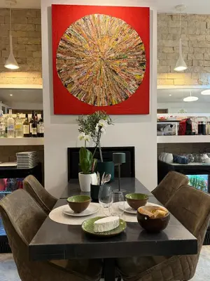 a table with plates of food and flowers on it at Eleven, Boutique luxury house & garden in Boliqueime