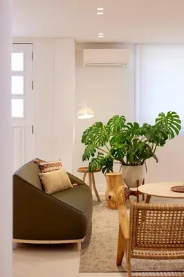 a living room with a couch and a table at Bougainvillea 33 by My Cozy Home in Faro