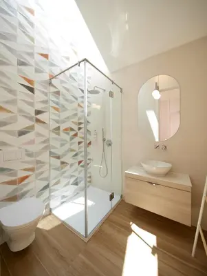 a bathroom with a shower and a toilet and a sink at Bougainvillea 33 by My Cozy Home in Faro