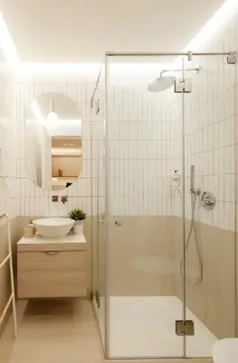 a bathroom with a glass shower with a sink at Bougainvillea 33 by My Cozy Home in Faro