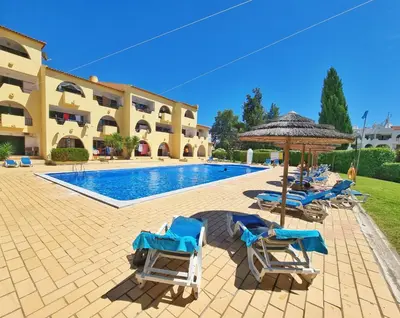 a bedroom with a large bed and a window at #014 Mar & Praia Albufeira by Home Holidays in Albufeira