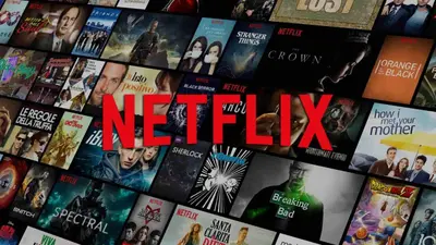 a bunch of books on a wall with the words netflix at AAA T2 Awesome Albufeira Apartments Piscina Marina in Albufeira