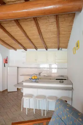 a blue dresser in a room with a mirror at SOLAR DOS AVÓS in Guia