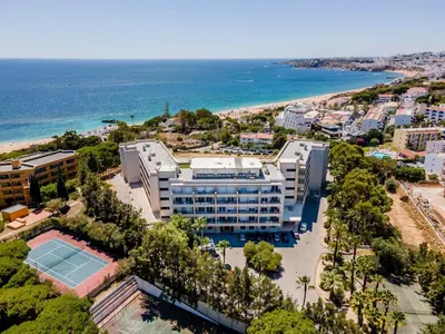 an aerial view of a resort and the beach at Algarve Beach Apartments in Albufeira