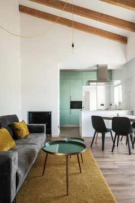 a living room with a couch and a table at Casa Monte dos Entrudos in Almancil