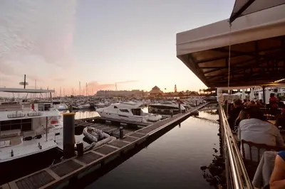 a group of boats docked at a marina at Villa Cove - Villa in complex only 5 minutes from the Marina of Vilamoura in Quarteira