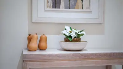 three vases sitting on top of a table at Vilamoura Apartment Jacaranda - By Dalma Portuguesa in Vilamoura