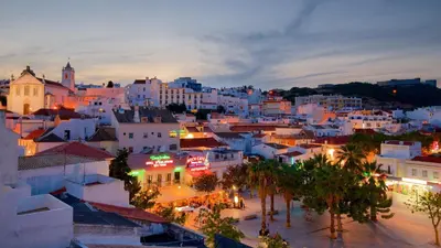 a view of a city at night at Prime by Check-in Portugal in Albufeira