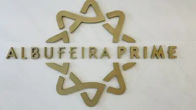 a sign for the alfalfa pettiae at Prime by Check-in Portugal in Albufeira