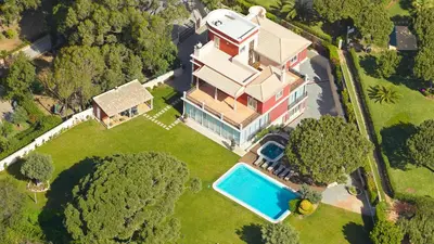 an aerial view of a house with a swimming pool at Vila Santa Eulália in Albufeira