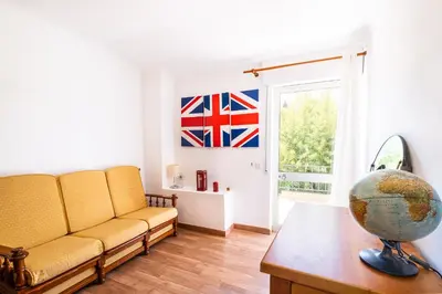 a bedroom with a bed with two towels on it at #047 Families Only - Almond Tree by Home Holidays in Albufeira
