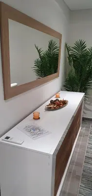 a white counter with a plate of food on it at Beach View Vela House in Albufeira