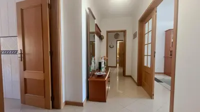 a hallway of a house with a table in the middle at Casa Old Town Splendida in Albufeira