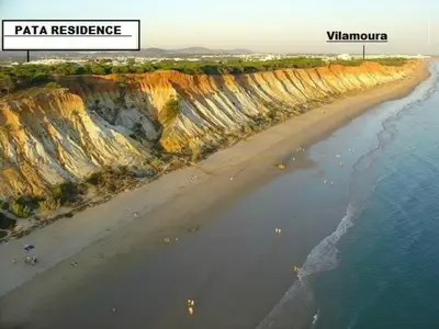 an aerial view of a beach near the ocean at Beautiful 2-Bed Apartment in Olhos de Agua in Albufeira