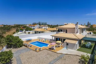 an aerial view of a house with a swimming pool at Villa Casa Grande by Villa Plus in Albufeira