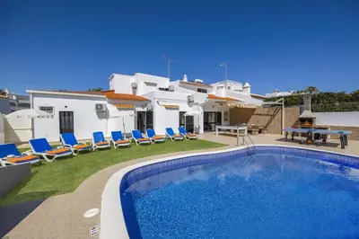a bathroom with a sink and a shower at Villa Pina by Villa Plus in Albufeira