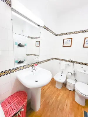 a bathroom with a sink and a toilet at T1 Tenis Golf Mar- Marina de Vilamoura- Piscina in Vilamoura