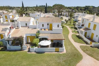 an aerial view of a villa with white houses at Aldeia do Golfe - Private condominium by HD in Vilamoura