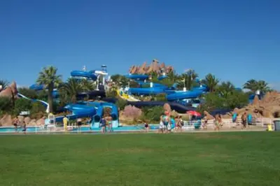 a large water park with a water slide at Remarkable 1-Bed Apartment in Olhos de Agua in Albufeira