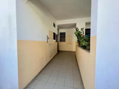 an empty hallway of a building with a plant at Albufeira Classic 1 With Pool by Homing in Albufeira