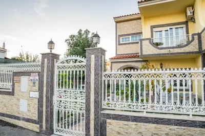 a villa with a swimming pool and a house at T1 Anastacio in Albufeira