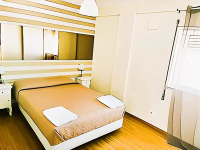 a bedroom with a bed in a room at Flat 3 Bedrooms Albufeira in Albufeira