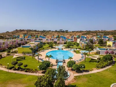 an aerial view of a resort with a swimming pool at Lovely LM Penthouse in Albufeira