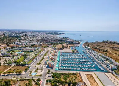 an aerial view of a marina with boats at Lovely LM Penthouse in Albufeira