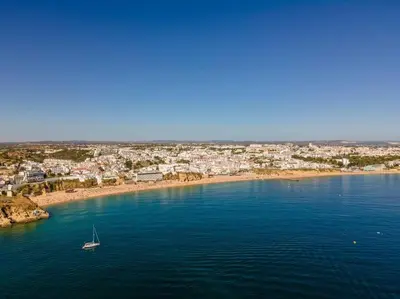 an aerial view of a boat in a body of water at Lovely LM Penthouse in Albufeira