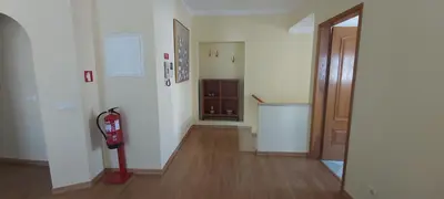 a room with a fire hydrant in the middle of a room at Casa da Travessa - casa de férias no coração de Faro in Faro
