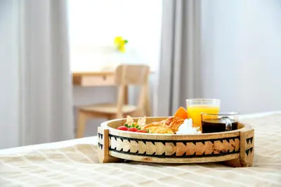 a tray of food and drinks on a table at Algarve Sweetness Apartment in Faro