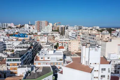 a view of a city with buildings at Privilege Deluxe Apartment Casa Mãe, Faro in Faro