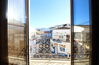 a view from a window of a city at Old Town Oasis 110m to Beach, AC & 2 Bathrooms by Vou de Férias in Albufeira