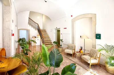 a living room filled with lots of plants at Salty Spot Apartment in Faro