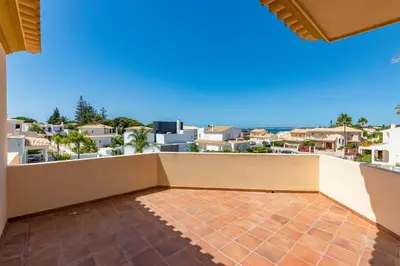 a balcony with a view of a city at Villa Ocre in Galé