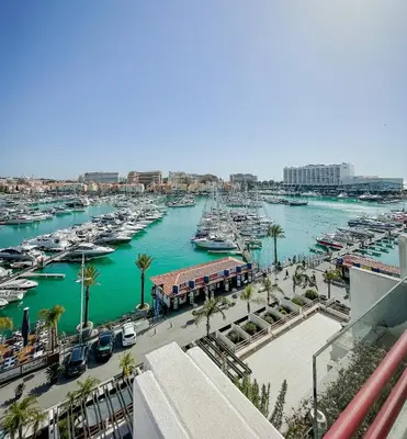 a view of a harbor with boats in the water at Penthouse Triplex com Jacuzzi T3 HsR Vilamarina in Vilamoura