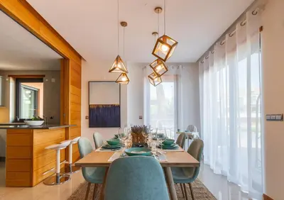 a dining room with a table and chairs at Algarve: Vale Lobo Golf&Beach with Private Pool II in Almancil